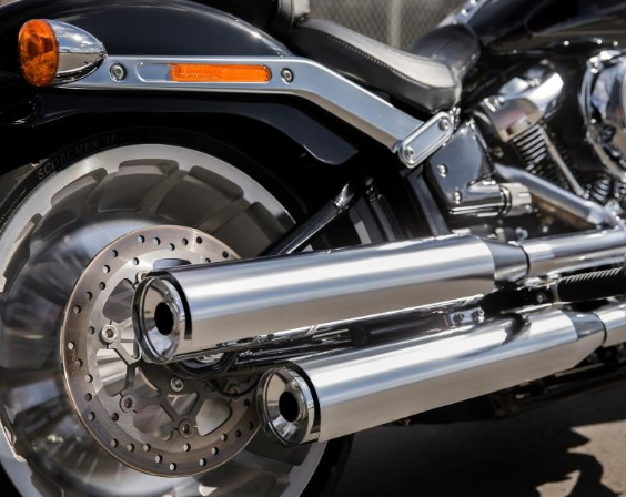 A Lansing man was arrested by the Drug Enforcement Administration (DEA) Thursday at the headquarters of a local motorcycle club in Owosso